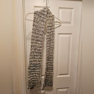 Tan scarf with a pop of blue